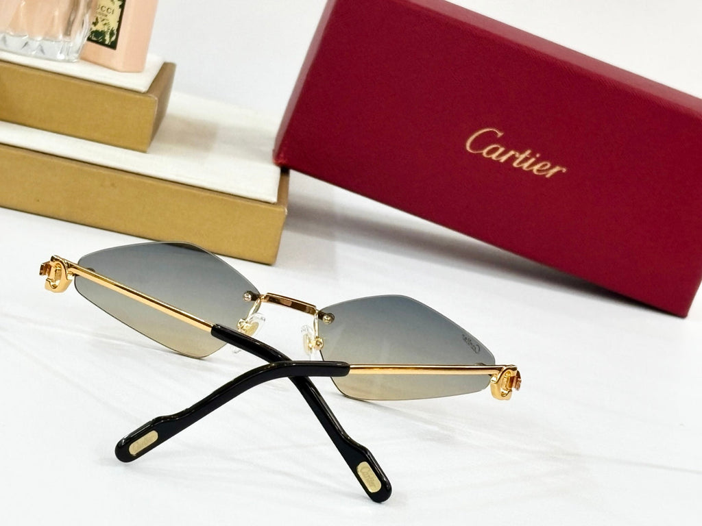 CARTIER C DE RIMLESS ANGULAR FRAME SUNGLASSES CT0695 IN METAL